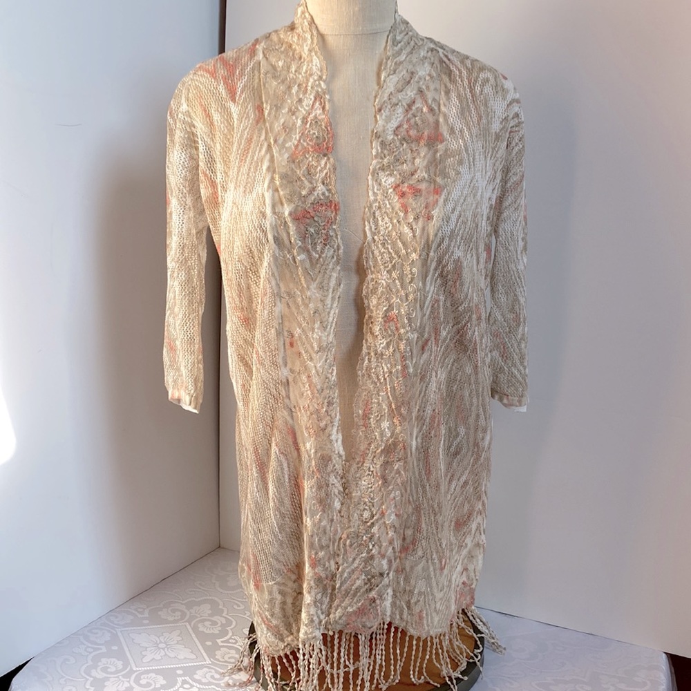 Lace knit cardigan in cream, tan and peach accents